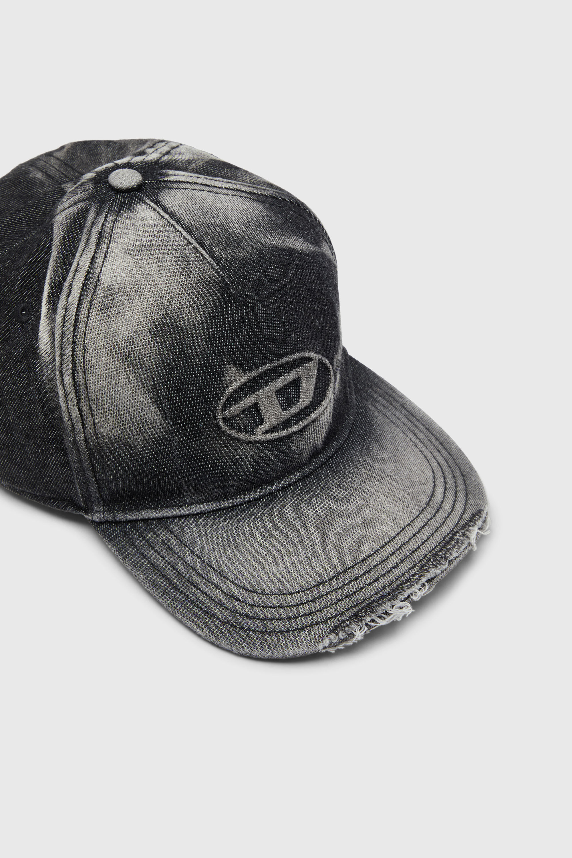 Baseball cap in destroyed denim